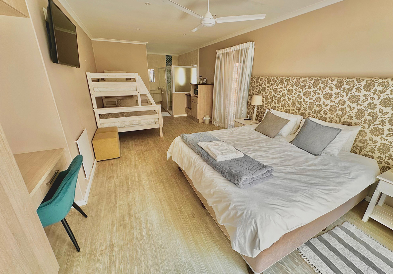 Retreat on Main | Luxury family room with private deck and kitchenette Retreat on Main | Luxury family room with private deck and kitchenette
